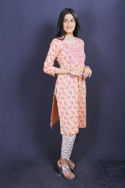 Women Peach Ethnic Print Straight Kurta Set with 3/4th sleeves